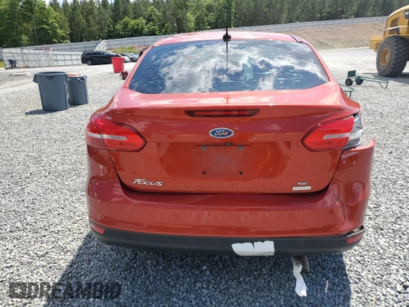 2018 Ford Focus SE with VIN 1FADP3FEXJL269131, listed as a Copart auction lot 55894765 with 33,752 mi miles and Salvage title. Bid and sale history available at DreamBid. Image 6.