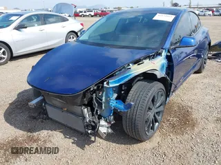2020 Tesla Model 3 Standard Range Plus z VIN 5YJ3E1EA5LF708885, wystawiony jako IAAI lot #42172952 z przebiegiem 58 882 mil mil oraz . Historia ofert i sprzedaży dostępna na DreamBid. Obrazek 6.