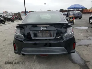 2015 Scion tC z VIN JTKJF5C75F3093123, wystawiony jako Copart lot #58414325 z przebiegiem 107 051 mil mil oraz Szkoda całkowita • Salvage title. Historia ofert i sprzedaży dostępna na DreamBid. Obrazek 6.
