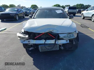 2014 BMW 3 Series 328i with VIN WBA3A5C55EP647035, listed as a IAAI auction lot 41480711 with 105,792 mi miles. Bid and sale history available at carsss.com. Image 12.
