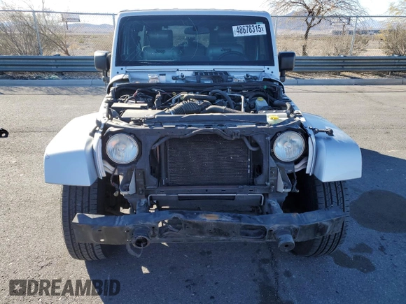 2007 Jeep Wrangler Unlimited Sahara with VIN 1J4GB59197L144781, listed as a Copart auction lot 48678315 with 137,538 mi miles and Salvage title. Bid and sale history available at DreamBid. Image 5.