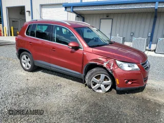 2010 Volkswagen Tiguan Wolfsburg Edition with VIN WVGAV7AX4AW003410, listed as a Copart auction lot 60645845 with 128,563 mi miles and Salvage title. Bid and sale history available at DreamBid. Image 4.