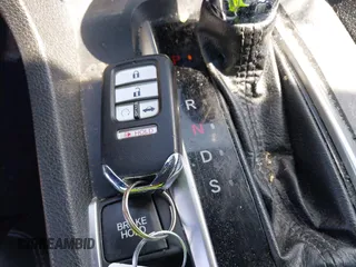 2019 Honda Civic Sport with VIN 2HGFC2F89KH569861, listed as a IAAI auction lot 41985114 with 104,880 mi miles and . Bid and sale history available at DreamBid. Image 11.