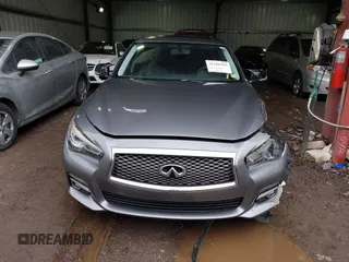 2015 Infiniti Q50 Premium z VIN JN1BV7ARXFM411040, wystawiony jako IAAI lot #41706295 z przebiegiem 97 297 mil mil oraz . Historia ofert i sprzedaży dostępna na DreamBid. Obrazek 12.