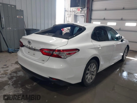 2019 Toyota Camry LE with VIN 4T1B11HK4KU853137, listed as a IAAI auction lot 41633785 with 67,629 mi miles and . Bid and sale history available at DreamBid. Image 4.