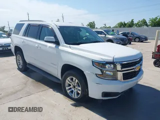 2015 Chevrolet Tahoe LS with VIN 1GNSCAKC7FR505378, listed as a IAAI auction lot 42210795 with 217,492 mi miles and . Bid and sale history available at DreamBid. Image 1.