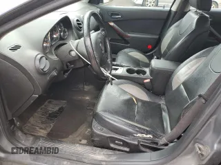 2009 Pontiac G6 GXP 1SA with VIN 1G2ZM577294217264, listed as a Copart auction lot 63824735 with 165,948 mi miles and Salvage title. Bid and sale history available at DreamBid. Image 7.