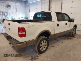2005 Ford F-150 XLT with VIN 1FTPW14595KF12361, listed as a IAAI auction lot 41851791 with 140,015 mi miles. Bid and sale history available at carsss.com. Image 4.