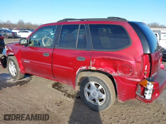 2002 GMC Envoy SLT with VIN 1GKDT13S222517064, listed as a IAAI auction lot 41590087 with 312,164 mi miles. Bid and sale history available at carsss.com. Image 18.