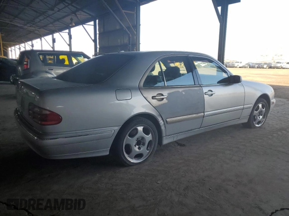 2001 Mercedes-Benz E-Class with VIN WDBJF70J51B167821, listed as a Copart auction lot 81113074 with 203,608 mi miles and Salvage Title. Bid and sale history available at carsss.com. Image 3.