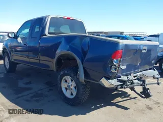 2003 Ford F-150 XL with VIN 1FTRX18WX3NA22323, listed as a IAAI auction lot 41635869 with 129,029 mi miles. Bid and sale history available at carsss.com. Image 3.