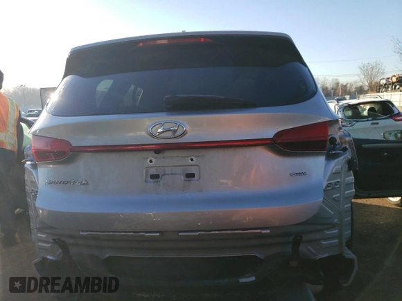 2022 Hyundai Santa Fe SE with VIN 5NMS1DAJ5NH395840, listed as a Copart auction lot 40544754 with 28,090 mi miles and . Bid and sale history available at DreamBid. Image 6.