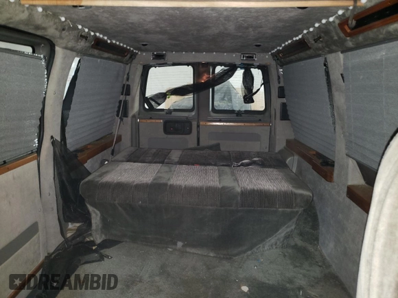 2004 GMC Savana Cargo Van YF7 Upfitter with VIN 1GDFG15T041147283, listed as a Copart auction lot 82193844 with 264,051 mi miles and Salvage Title. Bid and sale history available at carsss.com. Image 10.