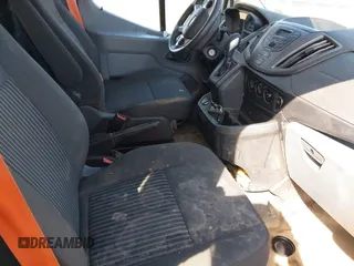 2019 Ford Transit z VIN 1FTYR2ZM1KKA68132, wystawiony jako IAAI lot #42094241 z przebiegiem 154 243 mil mil oraz . Historia ofert i sprzedaży dostępna na DreamBid. Obrazek 5.