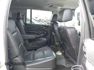2015 Chevrolet Suburban LTZ with VIN 1GNSKKKC5FR127201, listed as a IAAI auction lot 41706562 with 151,644 mi miles and . Bid and sale history available at DreamBid. Image 8.