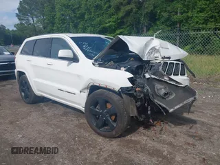 2015 Jeep Grand Cherokee Altitude z VIN 1C4RJEAG6FC707074, wystawiony jako IAAI lot #42241245 z przebiegiem 206 688 mil mil oraz . Historia ofert i sprzedaży dostępna na DreamBid. Obrazek 1.