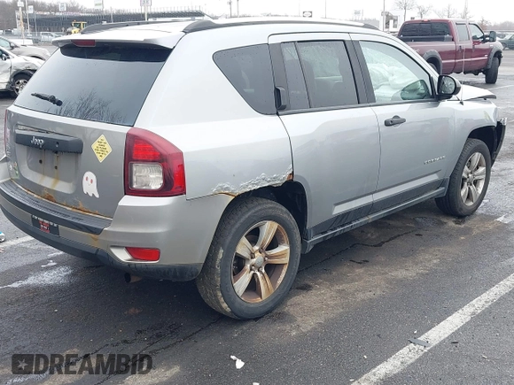 2014 Jeep Compass Sport with VIN 1C4NJDBB8ED734667, listed as a IAAI auction lot 41836914 with 221,028 mi miles. Bid and sale history available at carsss.com. Image 4.