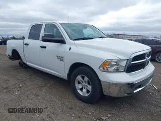 2023 Ram 1500 SLT z VIN 1C6RR7LG8PS516739, wystawiony jako IAAI lot #41930040 z przebiegiem 46 875 mil mil oraz . Historia ofert i sprzedaży dostępna na DreamBid. Obrazek 1.