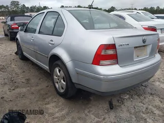 2004 Volkswagen Jetta GLS with VIN 3VWSR69MX4M065963, listed as a IAAI auction lot 41091439 with 196,158 mi miles and . Bid and sale history available at DreamBid. Image 3.