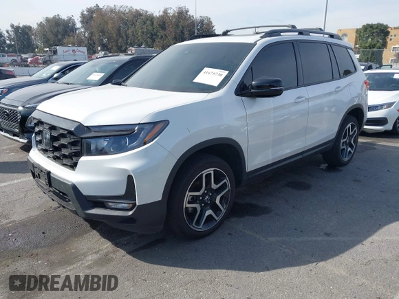 2023 Honda Passport Elite with VIN 5FNYF8H07PB010220, listed as a IAAI auction lot 41675730 with 25,128 mi miles and . Bid and sale history available at DreamBid. Image 2.