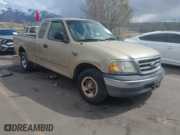 2000 Ford F-150 XL with VIN 1FTRX17W1YNB40253, listed as a IAAI auction lot 41959667 with 1 mi miles. Bid and sale history available at carsss.com. Image 1.