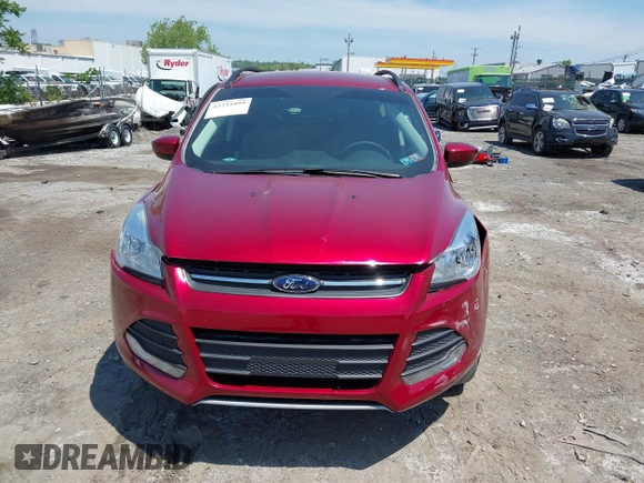 2016 Ford Escape SE z VIN 1FMCU9GX1GUC04815, wystawiony jako IAAI lot #42235499 z przebiegiem 84 713 mil mil oraz . Historia ofert i sprzedaży dostępna na DreamBid. Obrazek 12.
