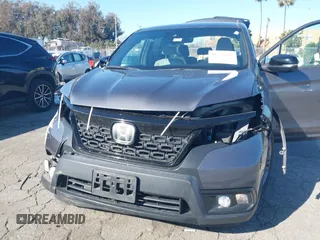 2019 Honda Passport EX-L with VIN 5FNYF7H58KB006501, listed as a IAAI auction lot 41752416 with 60,820 mi miles and . Bid and sale history available at carsss.com. Image 6.