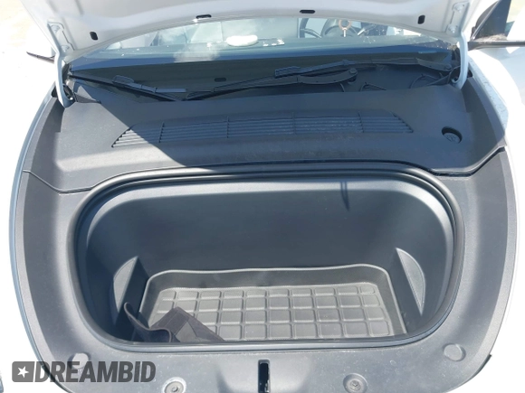 2023 Tesla Model Y Long Range with VIN 7SAYGDEE7PF865539, listed as a IAAI auction lot 42109673 with 34,923 mi miles and . Bid and sale history available at DreamBid. Image 10.
