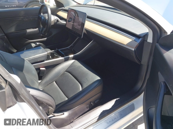 2019 Tesla Model 3 Mid Range with VIN 5YJ3E1EA1KF422983, listed as a IAAI auction lot 41861334 with 53,017 mi miles. Bid and sale history available at carsss.com. Image 5.