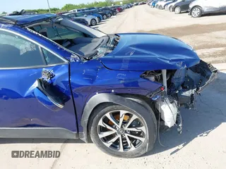2022 Toyota Corolla Cross XLE with VIN 7MUDAAAG8NV027585, listed as a IAAI auction lot 41781177 with 36,841 mi miles and . Bid and sale history available at DreamBid. Image 14.