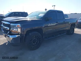 2016 Chevrolet Silverado 1500 LT with VIN 1GCVKREC7GZ123923, listed as a IAAI auction lot 41052739 with 122,837 mi miles. Bid and sale history available at carsss.com. Image 2.