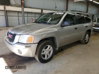 2005 GMC Envoy SLE with VIN 1GKDS13S352220344, listed as a Copart auction lot 70027194 with 234,427 mi miles and Salvage Title. Bid and sale history available at carsss.com. Image 1.