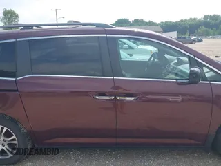 2011 Honda Odyssey EX-L with VIN 5FNRL5H6XBB096891, listed as a IAAI auction lot 42840531 with 214,842 mi miles and . Bid and sale history available at DreamBid. Image 14.