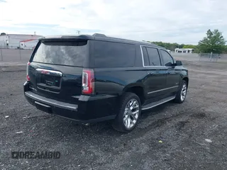 2017 GMC Yukon XL Denali with VIN 1GKS2HKJ4HR384139, listed as a IAAI auction lot 40239513 with 103,603 mi miles. Bid and sale history available at carsss.com. Image 4.