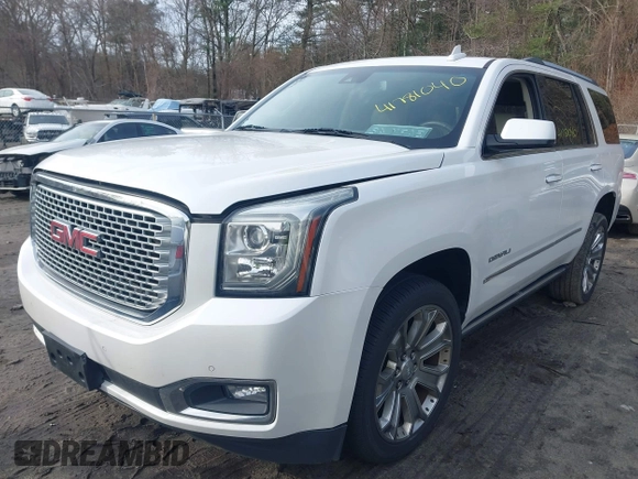 2016 GMC Yukon Denali with VIN 1GKS2CKJ9GR334645, listed as a IAAI auction lot 41781040 with 141,405 mi miles. Bid and sale history available at carsss.com. Image 17.