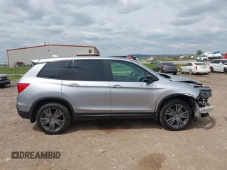 2020 Honda Passport EX-L with VIN 5FNYF8H59LB014260, listed as a IAAI auction lot 42274421 with 111,830 mi miles and . Bid and sale history available at DreamBid. Image 14.