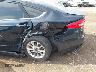 2020 Ford Fusion SE z VIN 3FA6P0HDXLR224898, wystawiony jako IAAI lot #42269794 z przebiegiem 55 023 mil mil oraz . Historia ofert i sprzedaży dostępna na DreamBid. Obrazek 6.