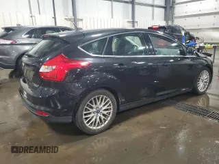 2014 Ford Focus Titanium with VIN 1FADP3N2XEL131392, listed as a Copart auction lot 61665025 with 105,597 mi miles and Salvage title. Bid and sale history available at DreamBid. Image 3.