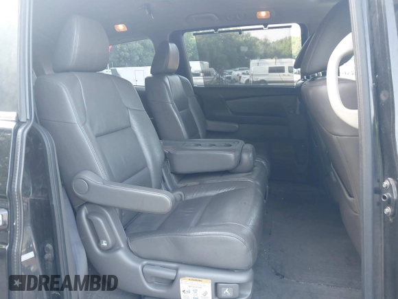 2012 Honda Odyssey EX-L with VIN 5FNRL5H60CB075811, listed as a IAAI auction lot 42518159 with 243,186 mi miles and . Bid and sale history available at DreamBid. Image 8.