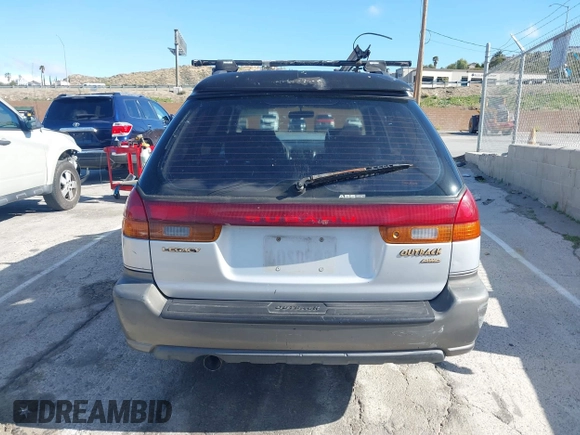 1999 Subaru Legacy Outback z VIN 4S3BG6850X6621723, wystawiony jako IAAI lot #41932992 z przebiegiem 283 200 mil mil oraz . Historia ofert i sprzedaży dostępna na DreamBid. Obrazek 16.