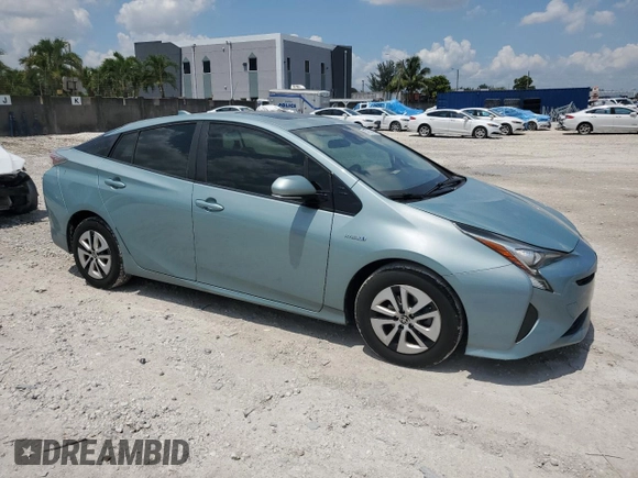2017 Toyota Prius Two z VIN JTDKARFUXH3040343, wystawiony jako Copart lot #57870425 z przebiegiem 59 711 mil mil oraz Szkoda całkowita • Salvage title. Historia ofert i sprzedaży dostępna na DreamBid. Obrazek 4.
