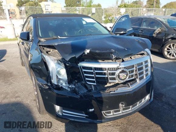 2014 Cadillac XTS Luxury with VIN 2G61M5S31E9290150, listed as a IAAI auction lot 41653055 with 174,553 mi miles and . Bid and sale history available at DreamBid. Image 6.