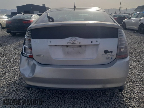 2007 Toyota Prius z VIN JTDKB20U473251436, wystawiony jako Copart lot #52282085 z przebiegiem Nie podano mil oraz Szkoda całkowita • Salvage title. Historia ofert i sprzedaży dostępna na DreamBid. Obrazek 6.