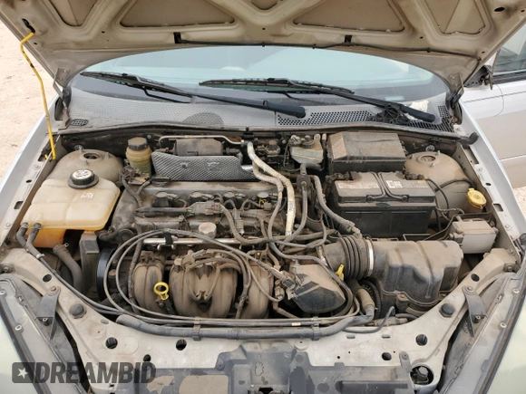 2004 Ford Focus with VIN 3FAFP37Z14R102723, listed as a Copart auction lot 44138195 with 220,354 mi miles and Salvage title. Bid and sale history available at DreamBid. Image 11.