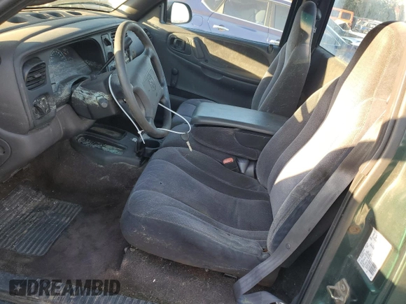 2000 Dodge Dakota z VIN 1B7FL26X5YS781647, wystawiony jako Copart lot #83320044 z przebiegiem Nie podano mil oraz Szkoda całkowita • Salvage title. Historia ofert i sprzedaży dostępna na DreamBid. Obrazek 7.