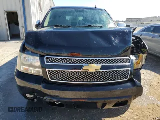 2014 Chevrolet Suburban LT with VIN 1GNSCJE04ER156583, listed as a Copart auction lot 73730364 with 243,131 mi miles and Clean Title. Bid and sale history available at carsss.com. Image 5.
