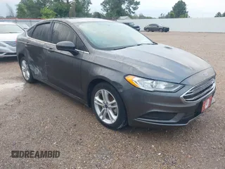 2018 Ford Fusion S z VIN 3FA6P0UU9JR122947, wystawiony jako IAAI lot #42219747 z przebiegiem 97 851 mil mil oraz . Historia ofert i sprzedaży dostępna na DreamBid. Obrazek 1.