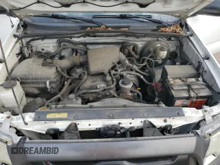 2014 Toyota Tacoma with VIN 5TFNX4CN7EX037335, listed as a Copart auction lot 60733635 with 115,341 mi miles and Salvage title. Bid and sale history available at DreamBid. Image 11.