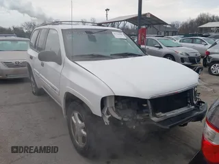 2005 GMC Envoy SLT with VIN 1GKDT13S952190876, listed as a IAAI auction lot 41308686 with 244,774 mi miles. Bid and sale history available at carsss.com. Image 13.