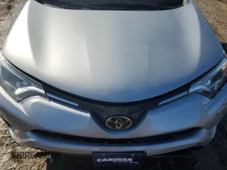 2018 Toyota RAV4 LE with VIN 2T3BFREV2JW730084, listed as a Copart auction lot 50386335 with 56,650 mi miles and Salvage Title. Bid and sale history available at carsss.com. Image 13.